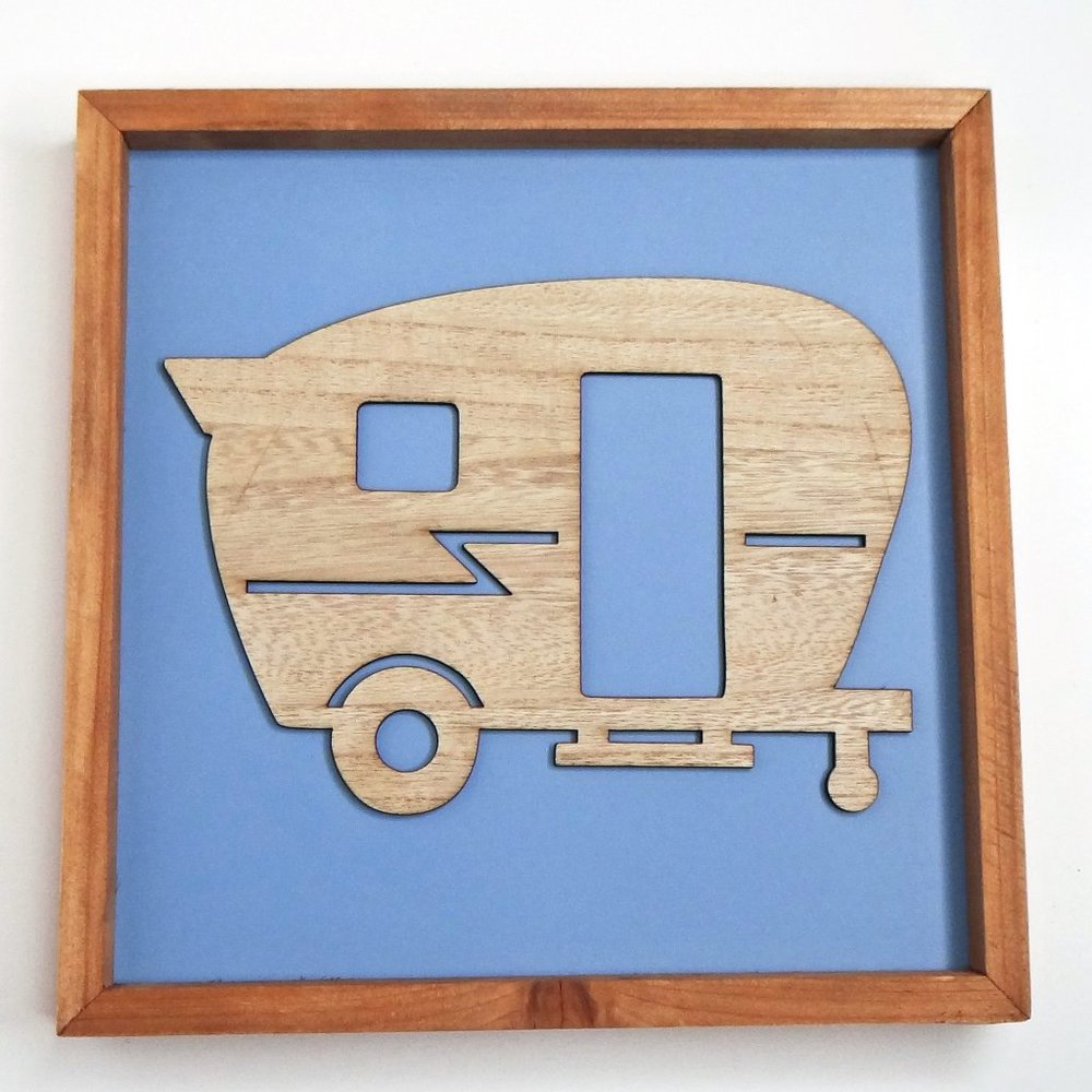 Wood RV/ Camper Cut Out on Blue Background and Natural Wood Frame